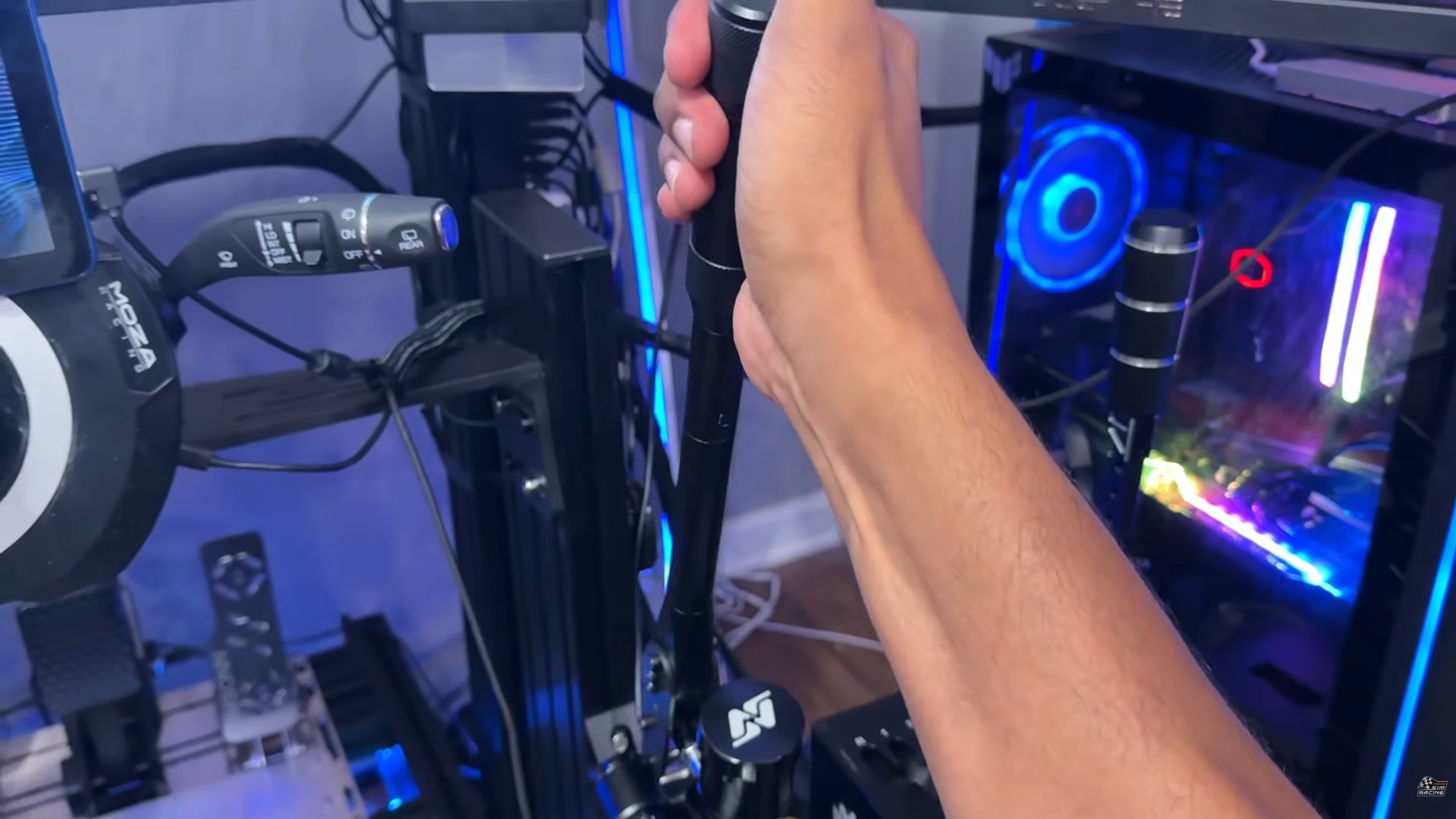 Pulling the SimNet SHB-100 handbrake lever mounted on a sim racing rig