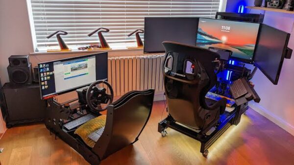 Dual sim racing rig setup with cockpits and multi-monitor displays
