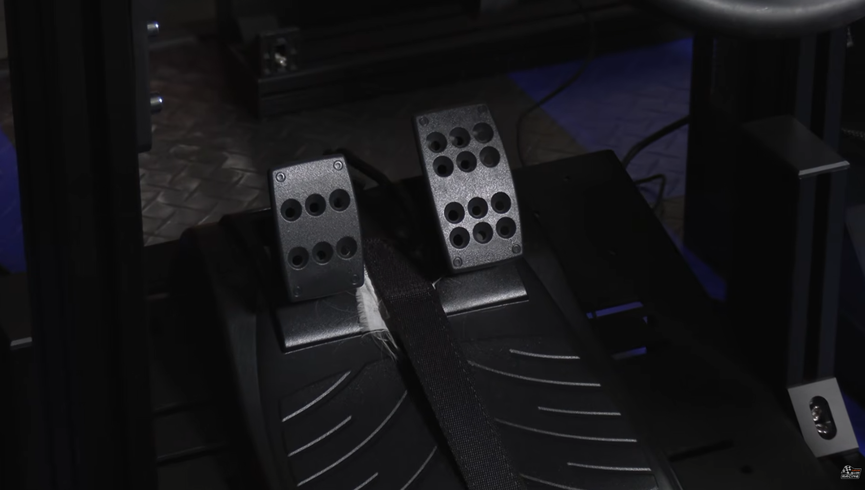 Logitech Driving Force GT pedals ratchet strapped to a sim racing pedal deck
