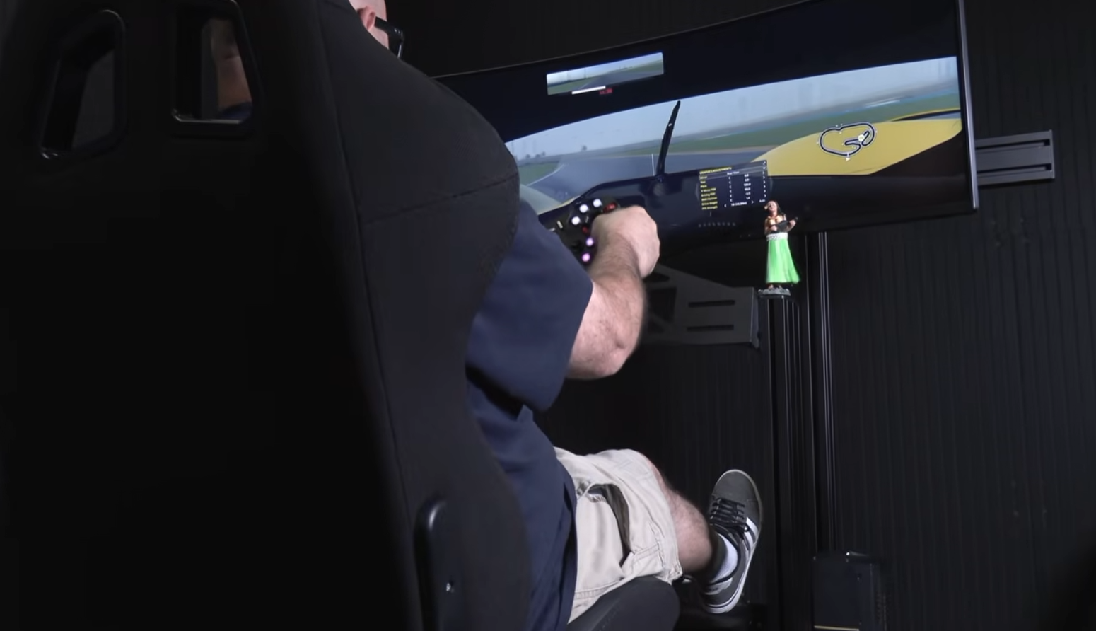 MOZA HMA150 3DOF motion rig with a 49-inch Samsung monitor mounted to the rig